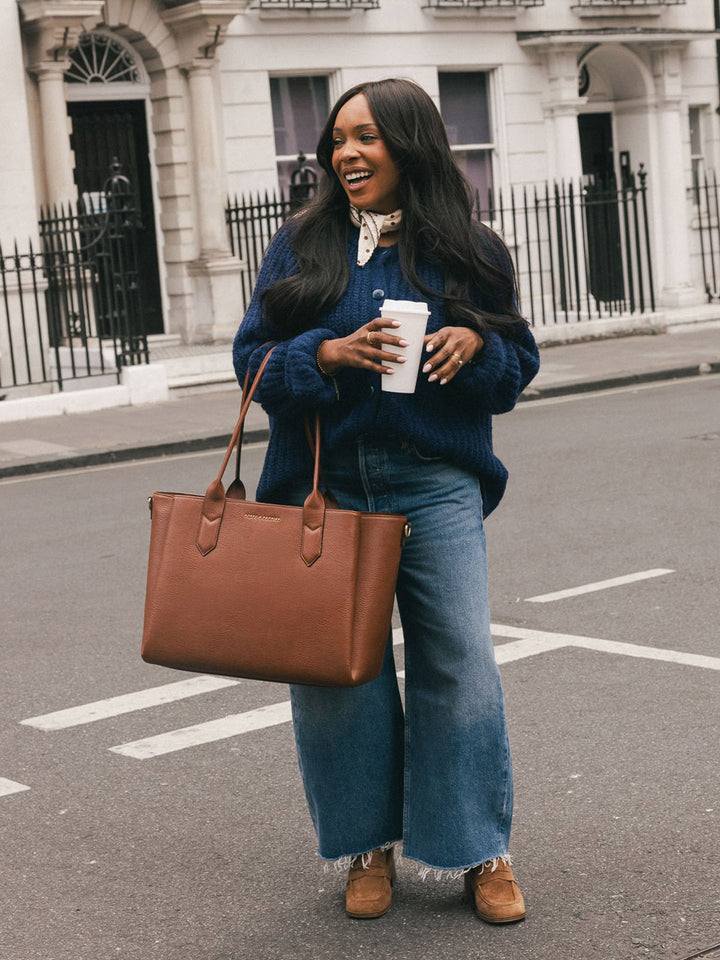 Poppy & Peonies Double Duty Tote in Chestnut carried comfortably using the top handles.