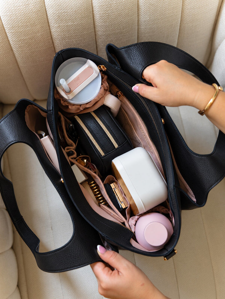 Poppy & Peonies The Companion Tote in Black open top view, highlighting the multiple interior compartments and organized storage.
