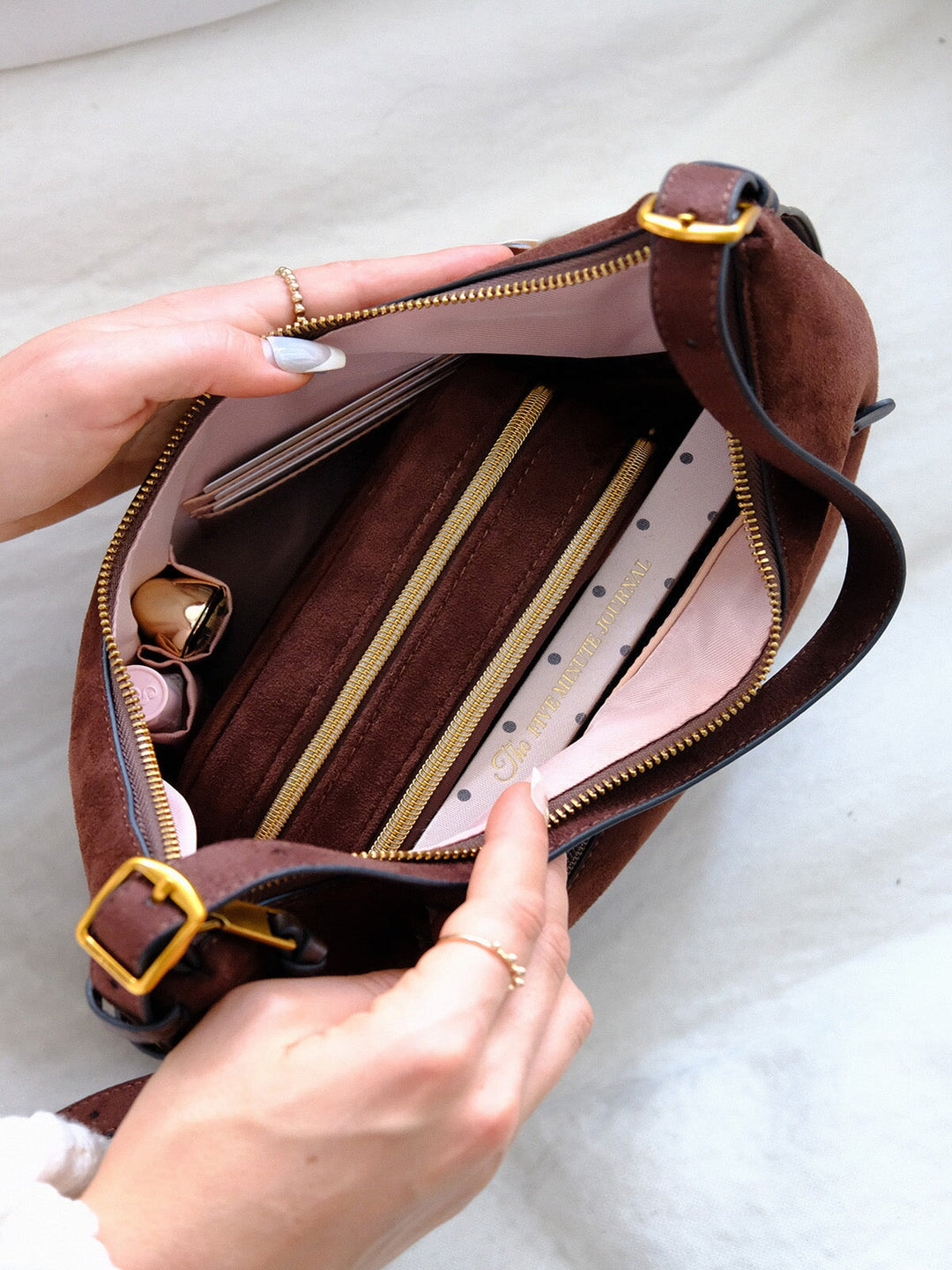 Poppy & Peonies The Sunday Bag in Espresso Suede open top view, showcasing the blush interior, zippered compartment and organized storage for everyday essentials.