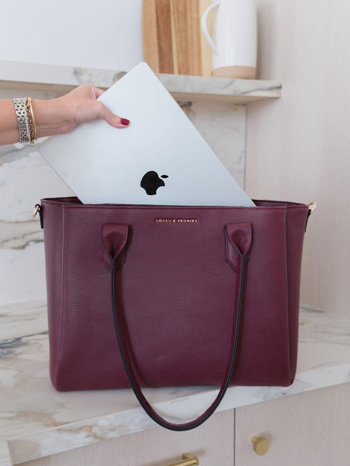 Poppy & Peonies Double Duty Tote in Berry fitting a laptop for work, travel and daily organization.