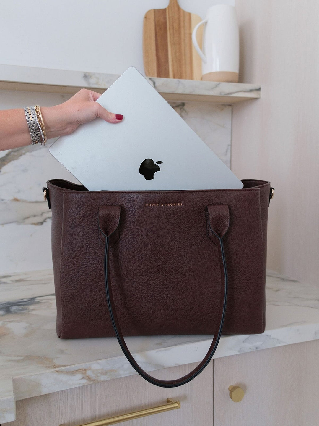 Poppy & Peonies Double Duty Tote in Espresso fitting a laptop for work, travel and daily organization.