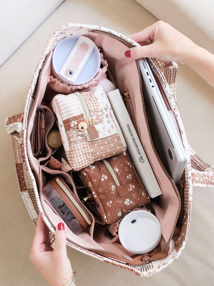 Top-down view of the Daydreamer Tote in Brown Patchwork highlighting its organized interior compartments and generous space for work, travel, and daily essentials.