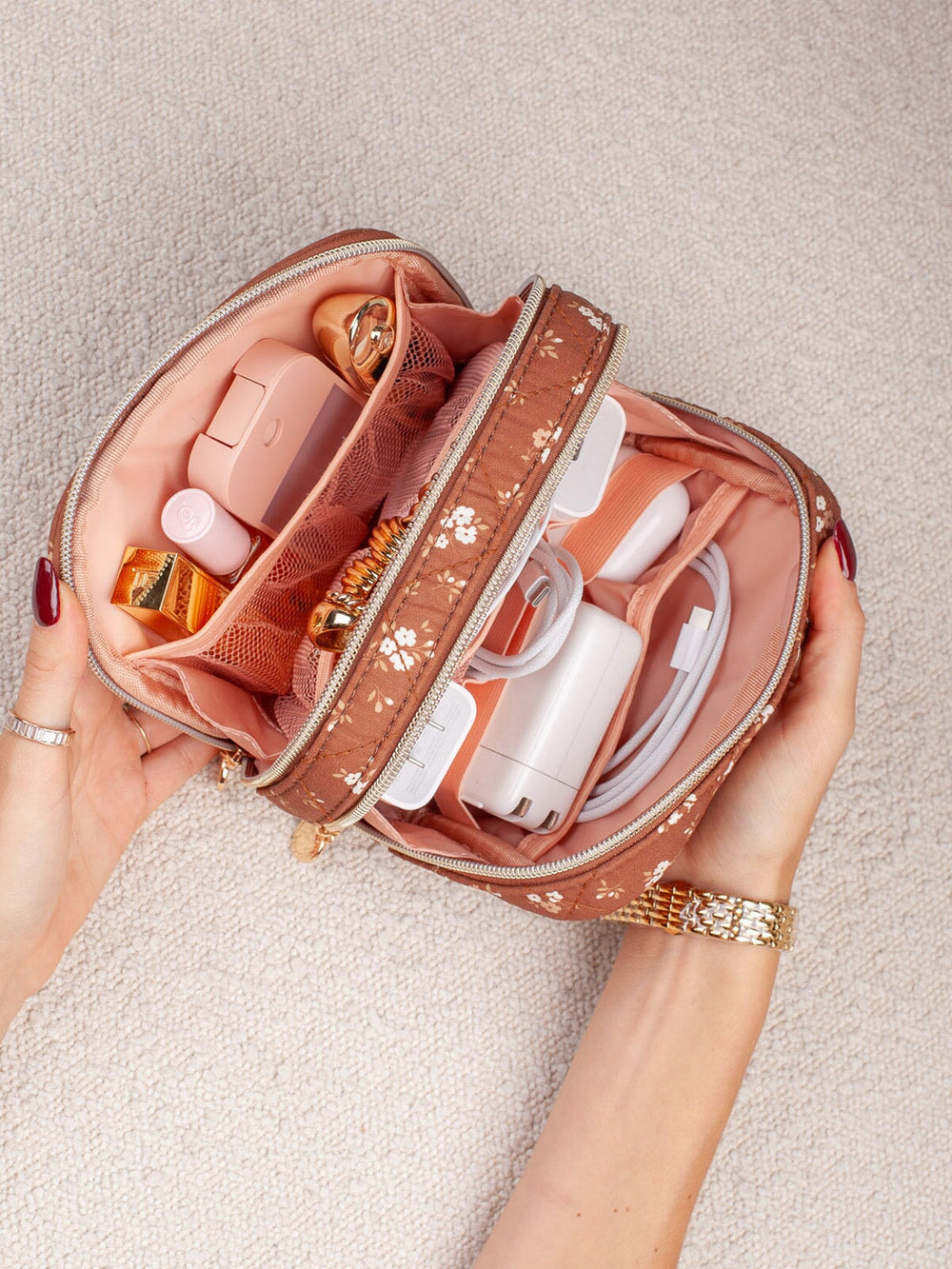 Poppy & Peonies Pretty Connected Case in Brown Floral open and filled with small tech accessories, showcasing organized storage for chargers, cables and everyday electronics.
