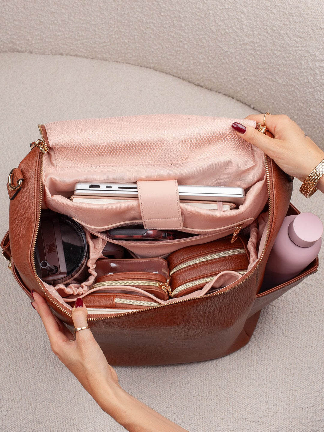 Poppy & Peonies Carryall Backpack in Chestnut open with organized interior compartments and essentials.