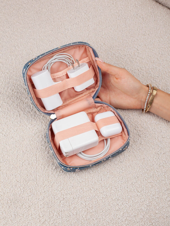 Poppy & Peonies Getaway Cosmetic Set in Navy Patchwork organizer with tech accessories secured inside.