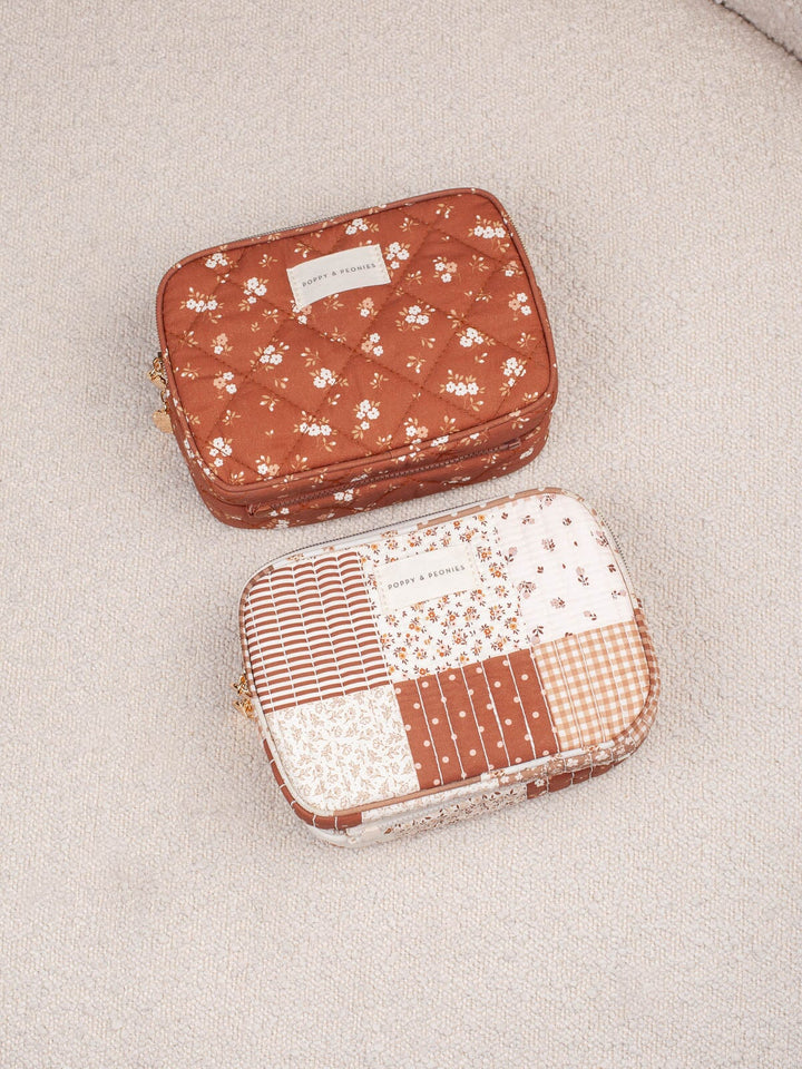 Product shot featuring the Poppy & Peonies The Split Organizer in Brown Floral and Brown Patchwork together, highlighting the coordinating warm-toned floral and patchwork prints.