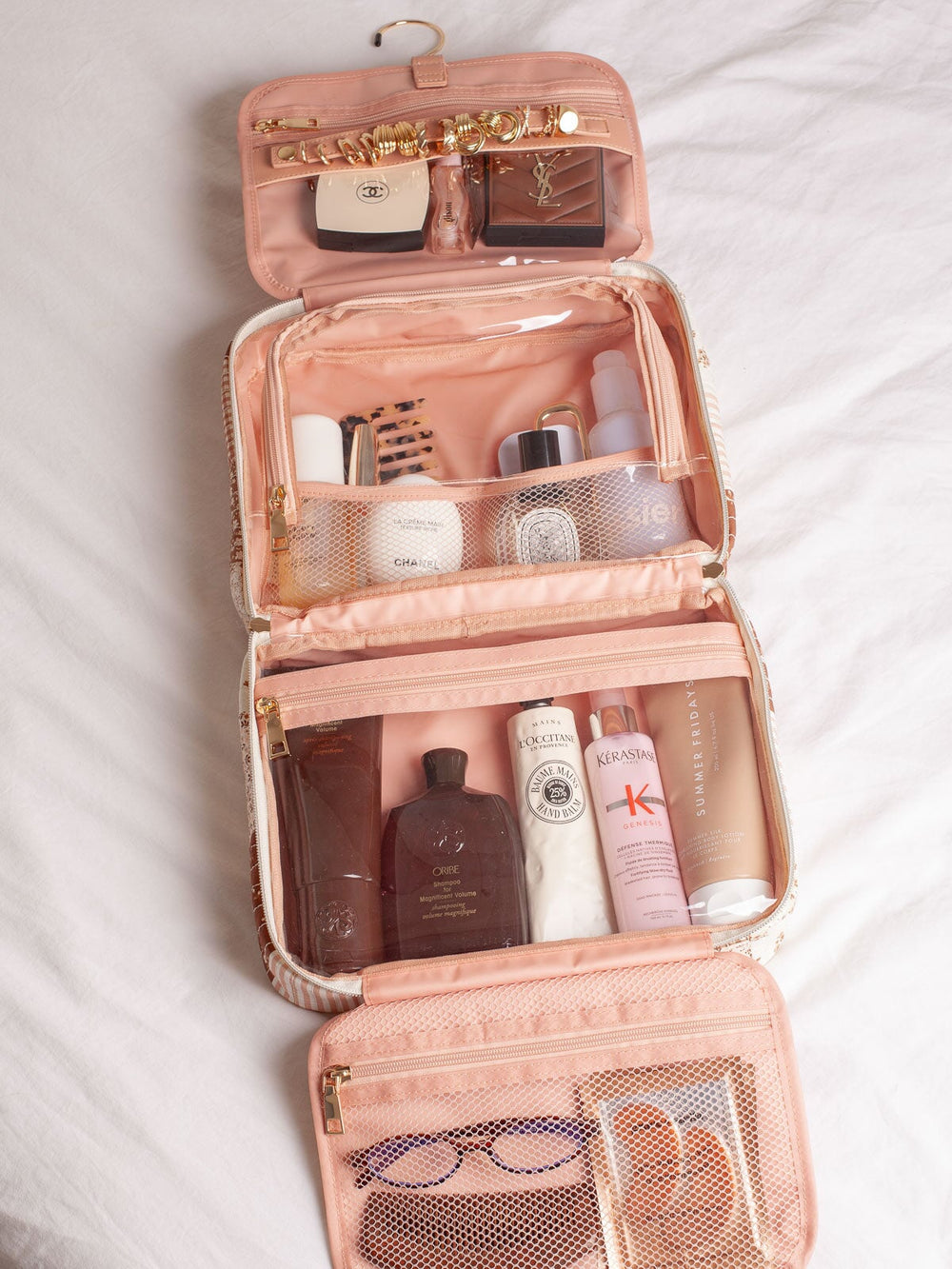 Poppy & Peonies Hook Me Up in Brown Floral opened to show jewelry storage, toiletries, and organized compartments.