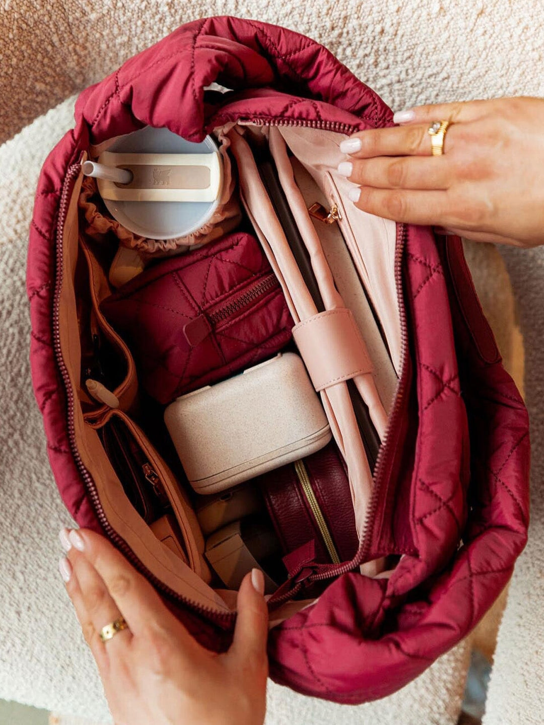 Berry coloured quilted bag with a blush interior
