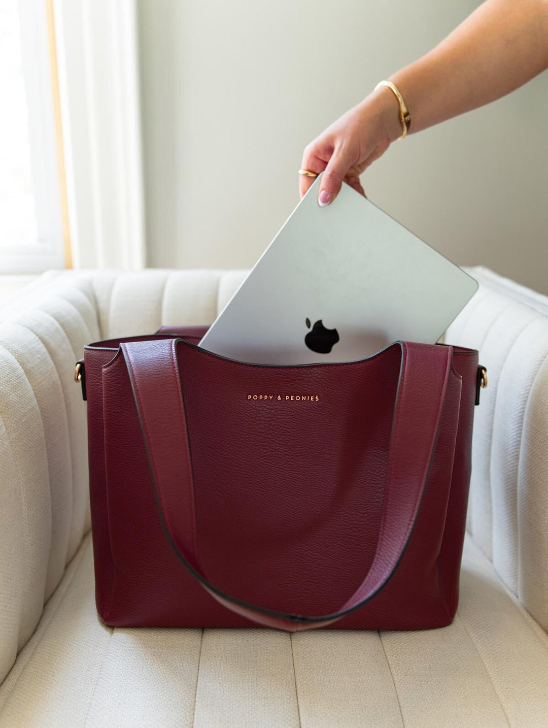 Poppy & Peonies The Companion Tote in Berry with laptop, showcasing the padded laptop compartment for organized everyday carry.