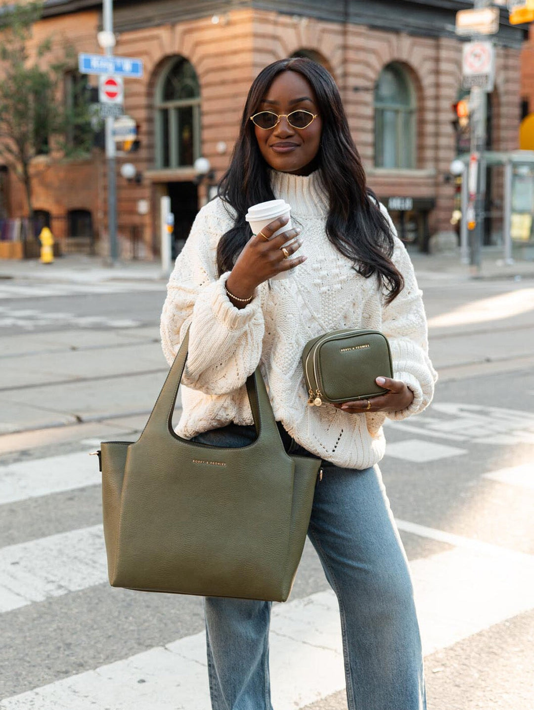 Poppy & Peonies The Companion Tote Bundle in Olive street-style view, featuring the Pretty Connected Case with the coordinating tote carried over the shoulder.