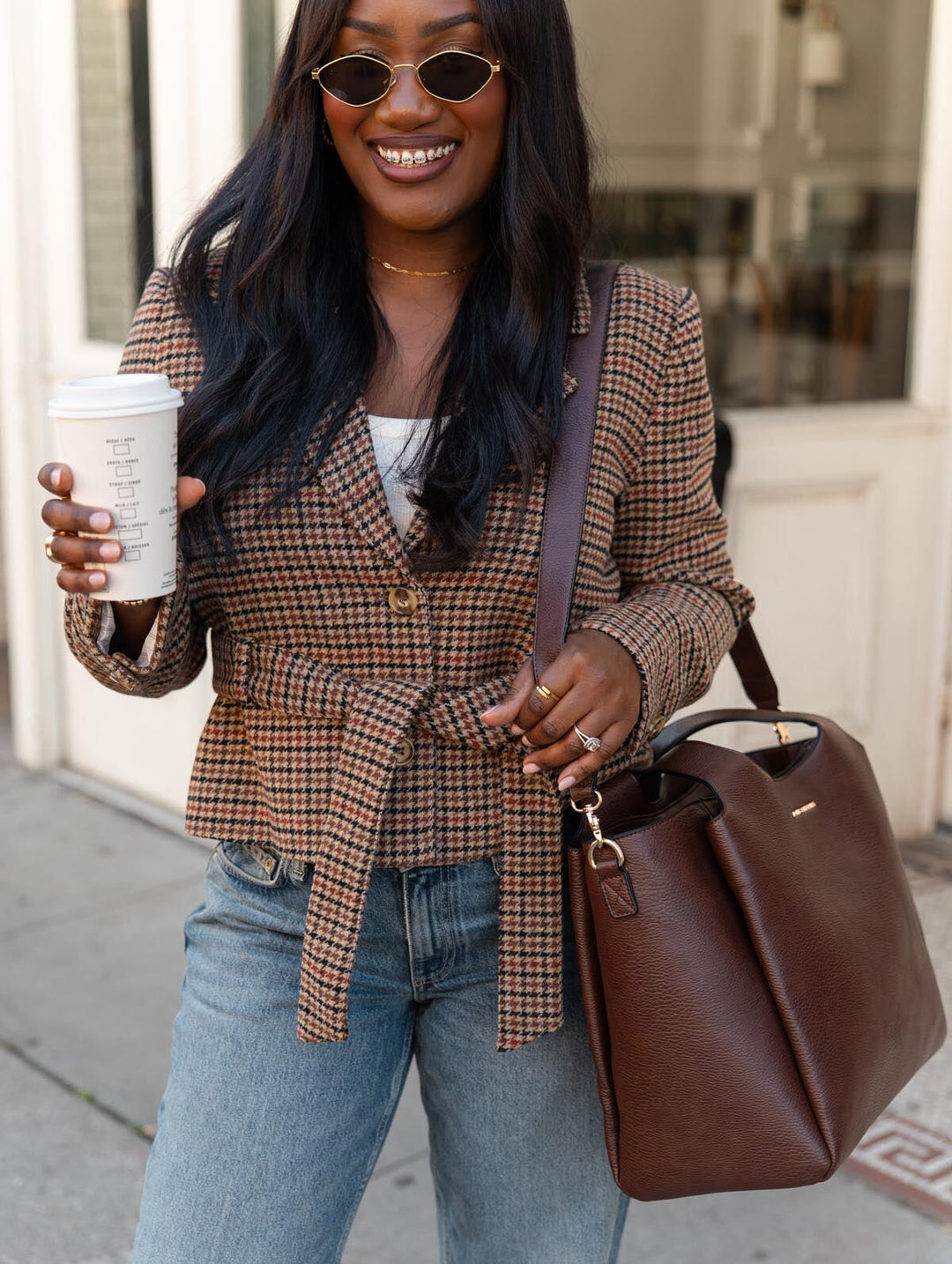 Poppy & Peonies The Companion Tote in Espresso worn over the shoulder, styled with a plaid blazer and jeans.