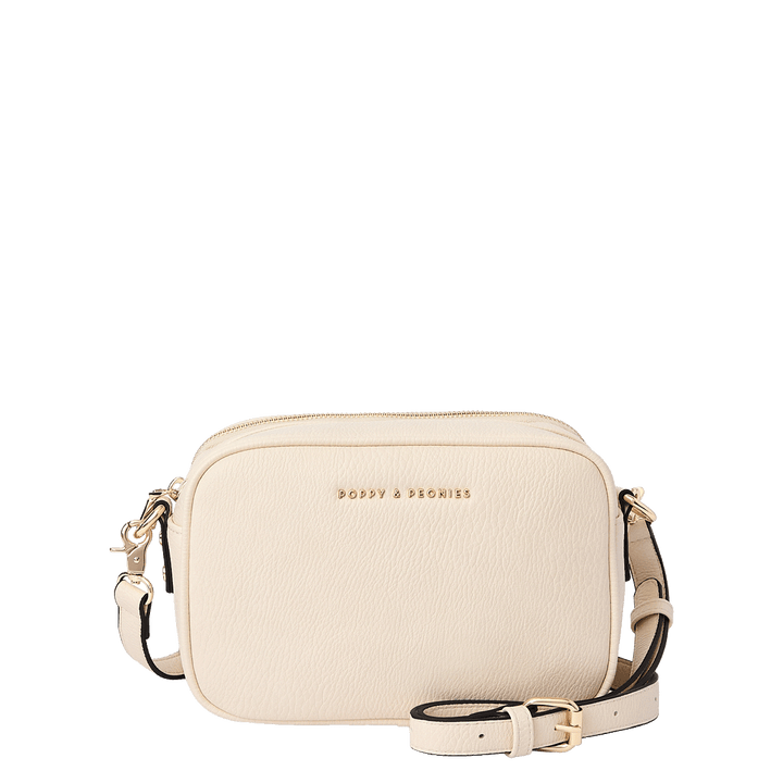 Cream vegan leather crossbody bag with a detachable strap