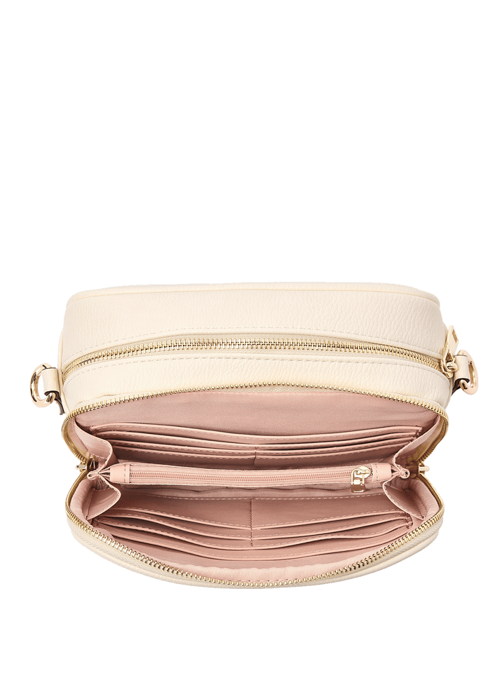 Cream vegan leather crossbody bag with a built in wallet
