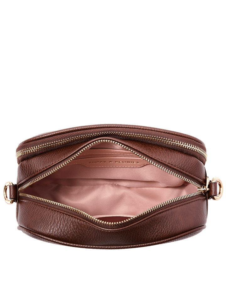 24/7 Crossbody in Espresso showing built-in wallet with card slots and organized interior