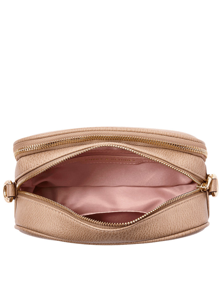 24/7 Crossbody in Taupe showing built-in wallet with card slots and organized interior