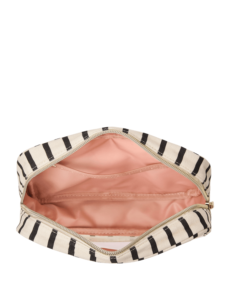 Open striped makeup bag with pink interior