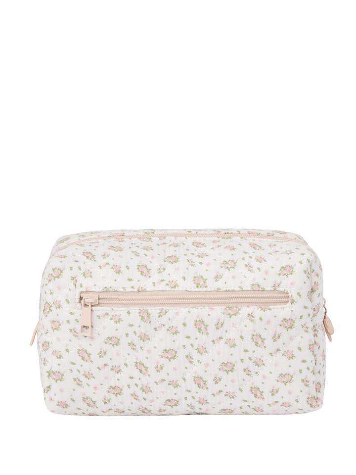 Floral-patterned toiletry bag with a pink zipper