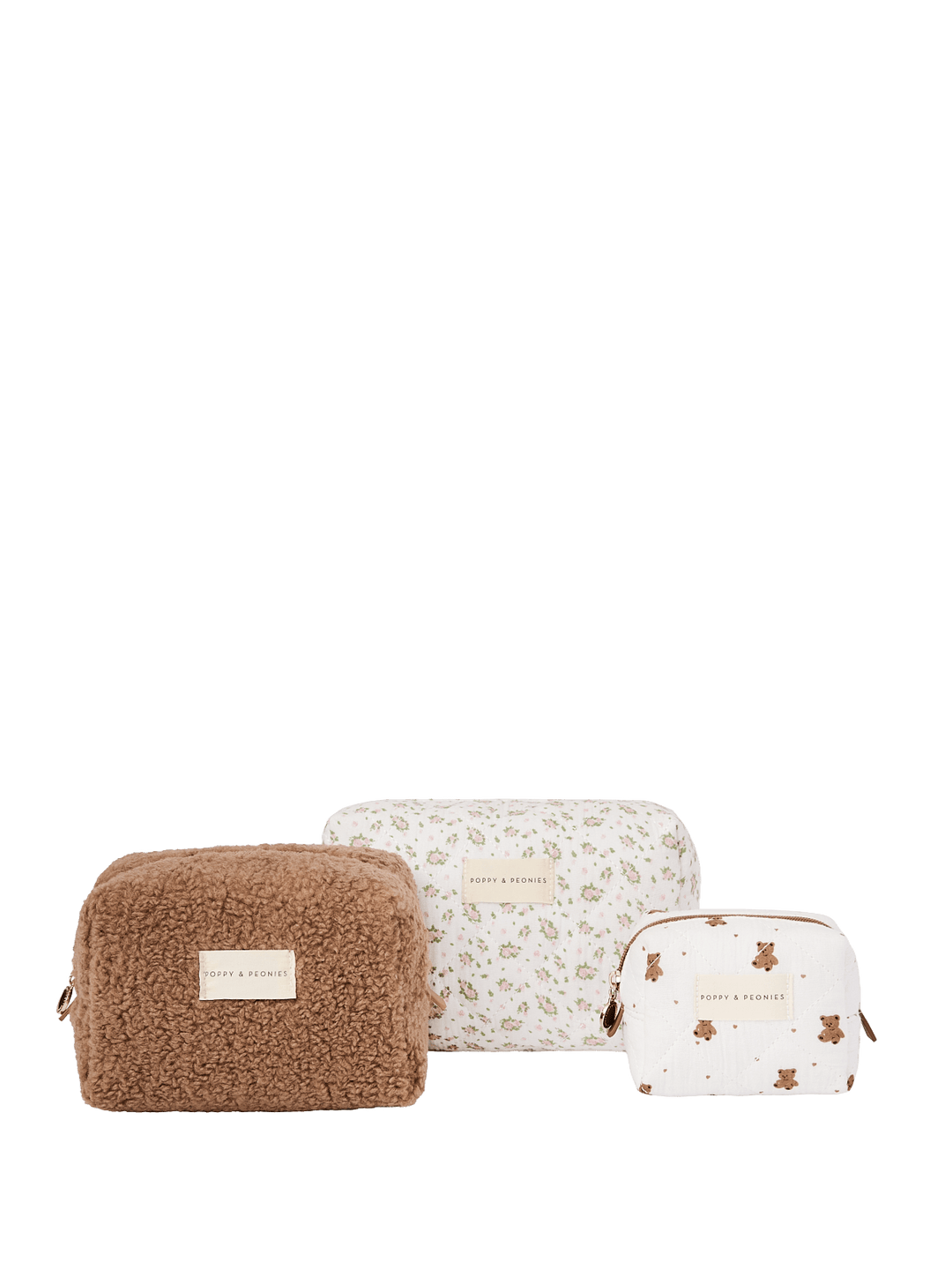 Three different sized cosmetic bags with different designs