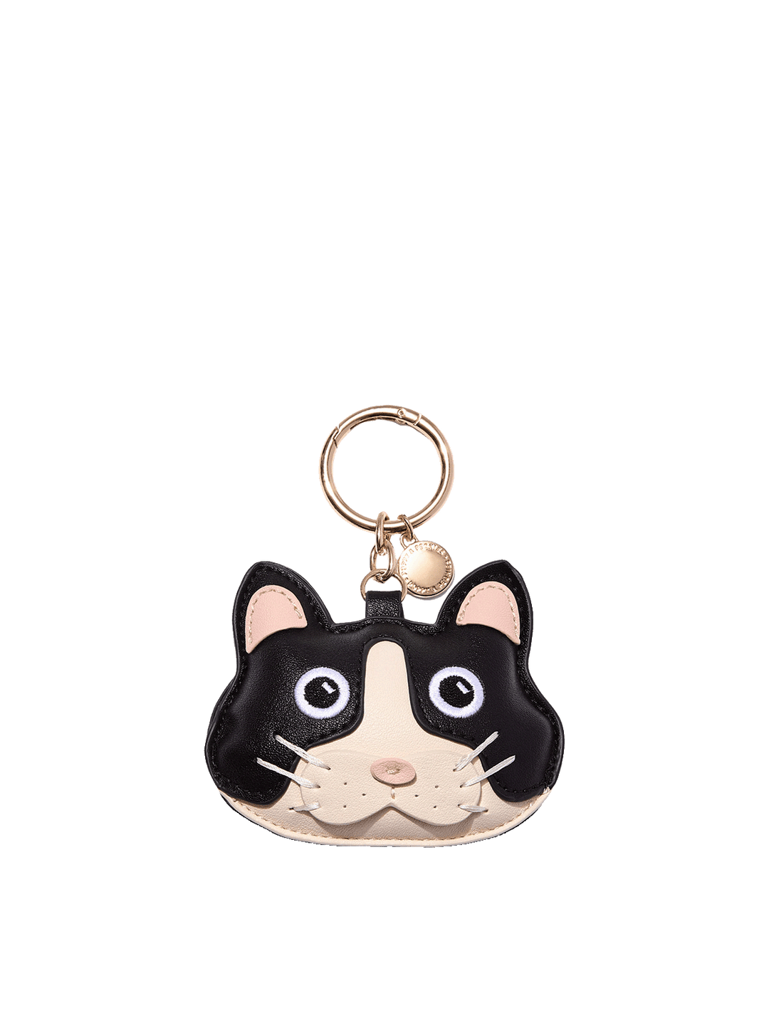 Poppy and Peonies Cat Bag Charm featuring a playful black and cream cat face design with pink inner ears, wide embroidered eyes, a pink nose, white whiskers, and gold-tone keyring hardware with a small round branded charm.