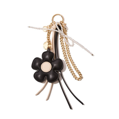 black and cream flower bag charm