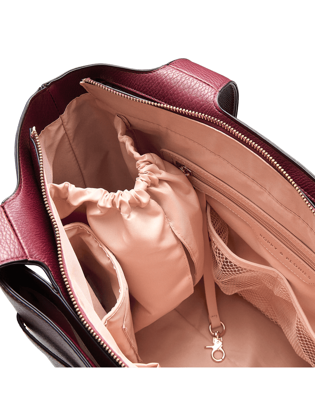 Open handbag revealing a pink interior