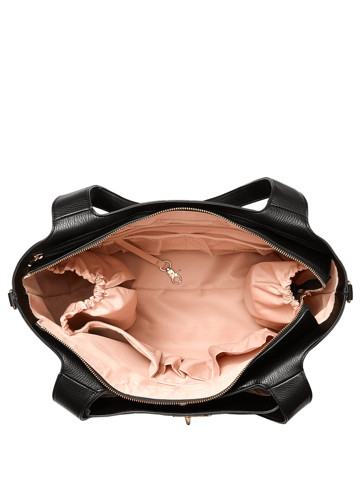 Black handbag with pink interior on a transparent background