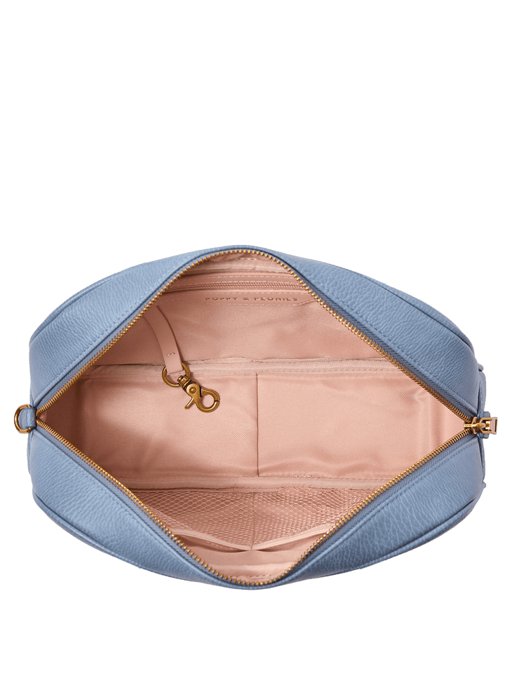 Interior of a light blue vegan leather shoulder bag