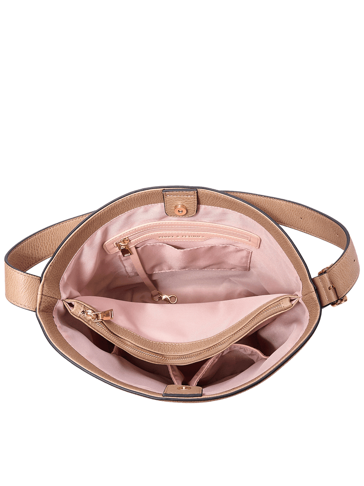 Interior of the Bucket Bag in Taupe showing zip compartment and organization pockets