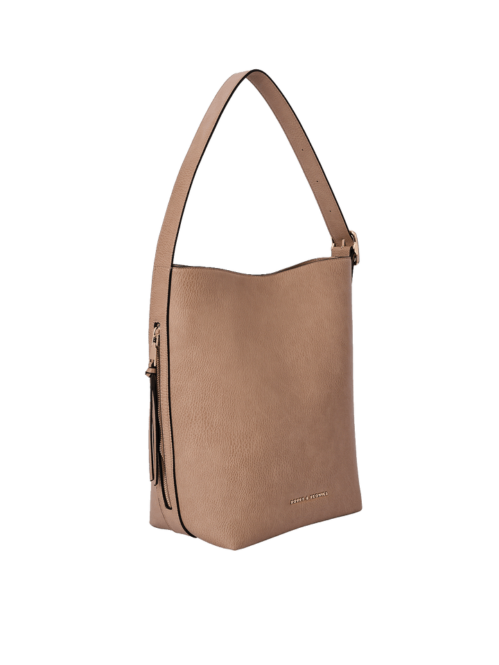 Side profile of the Bucket Bag in Taupe showing structured silhouette