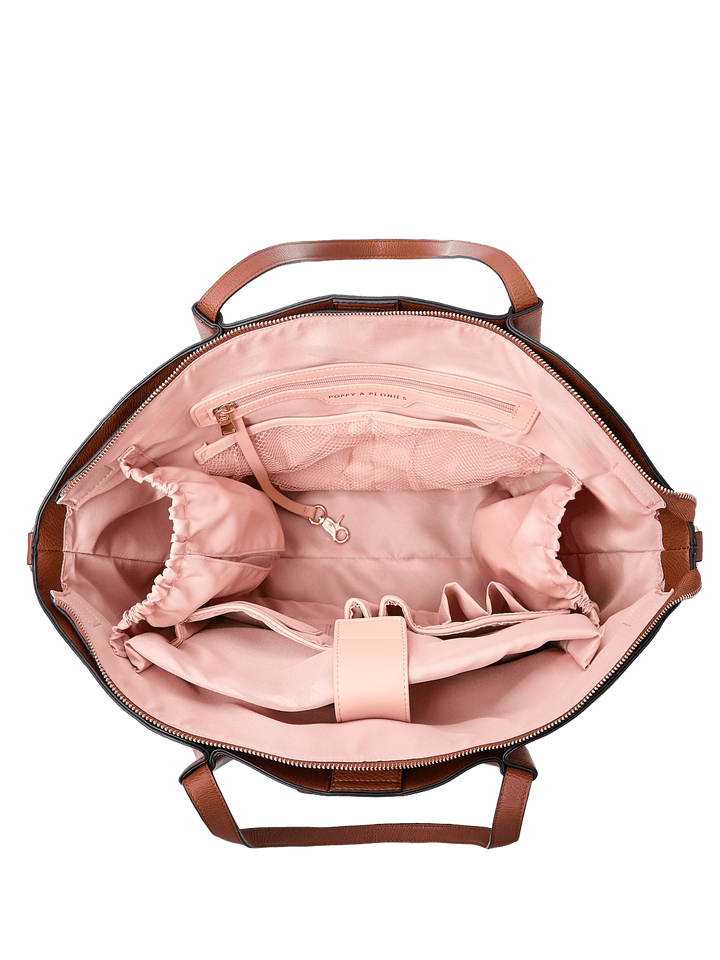 Poppy & Peonies The Knot Tote in Chestnut, shown open from above with blush pink lining, multiple compartments, and interior organizer pockets.