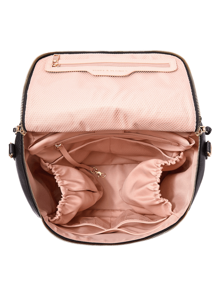 Interior of the Carryall Backpack in Black showing laptop compartment and organization pockets
