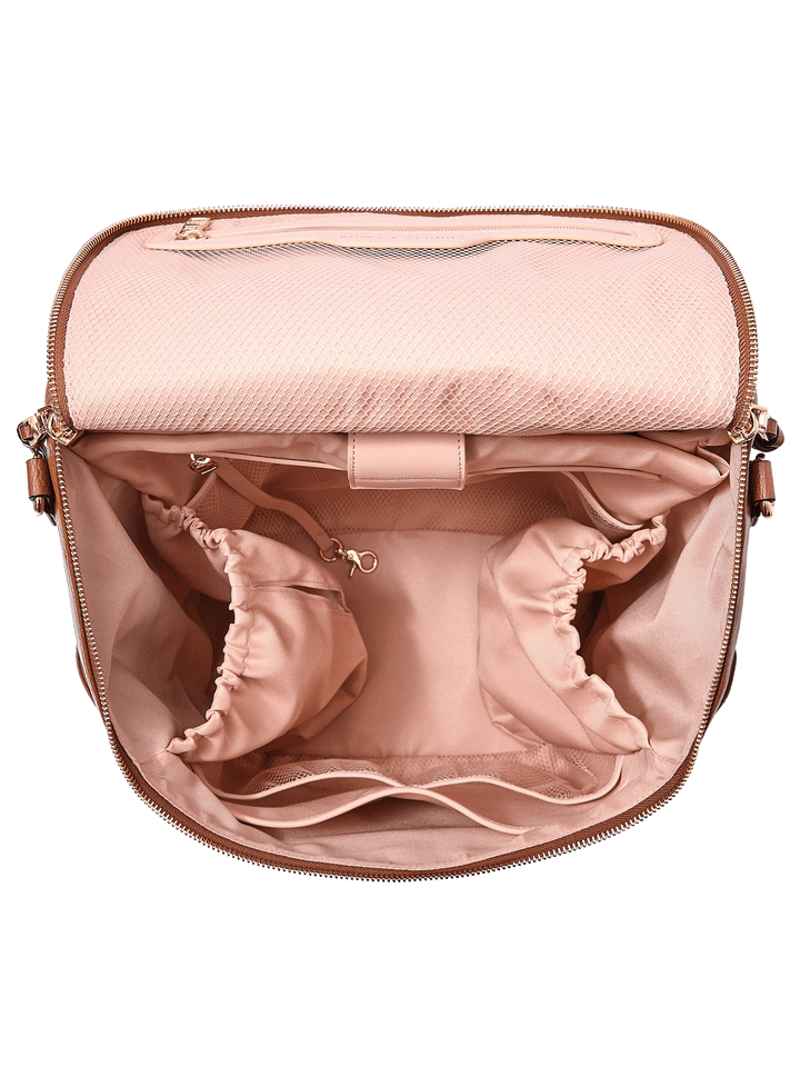 Interior of the Carryall Backpack in Chestnut showing laptop compartment and organization pockets