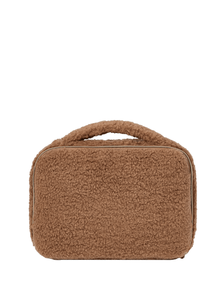 Faux fur cosmetic bag with a handle