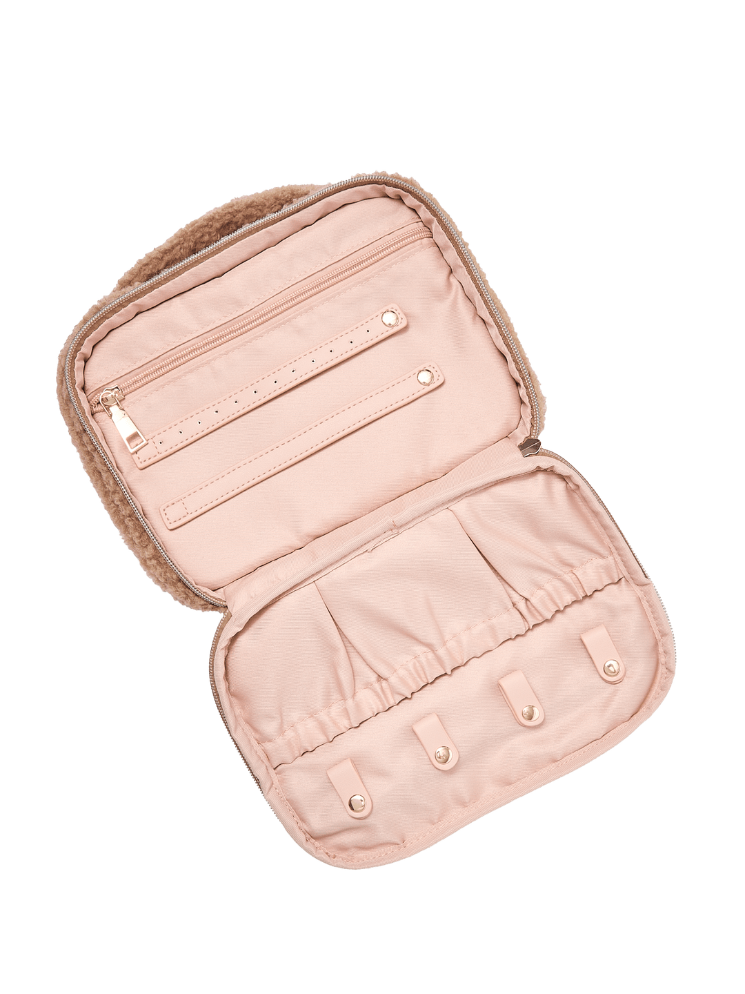 Interior of a cosmetic case with pockets and jewelry tabs