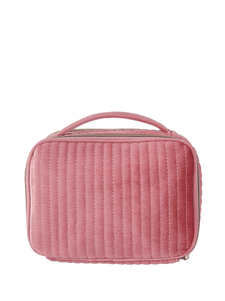 Pink velvet quilted cosmetic bag with a handle