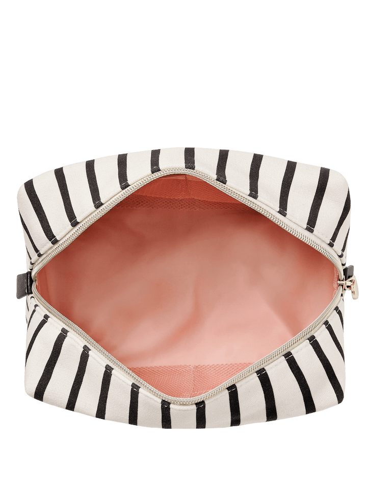 Open striped makeup bag with pink interior