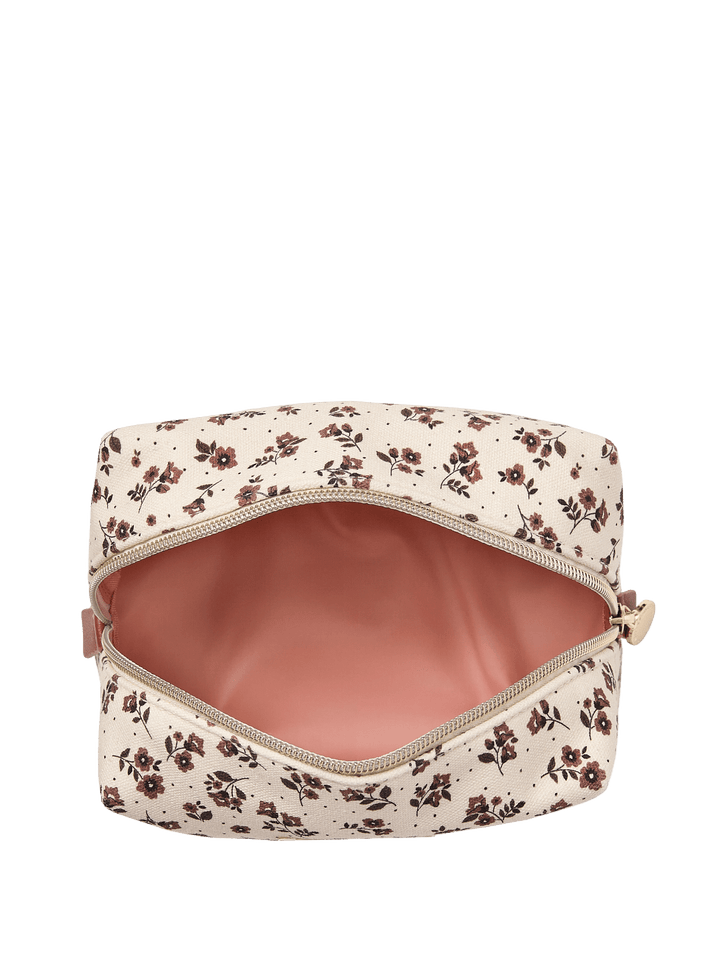 Open floral cosmetic bag with pink interior