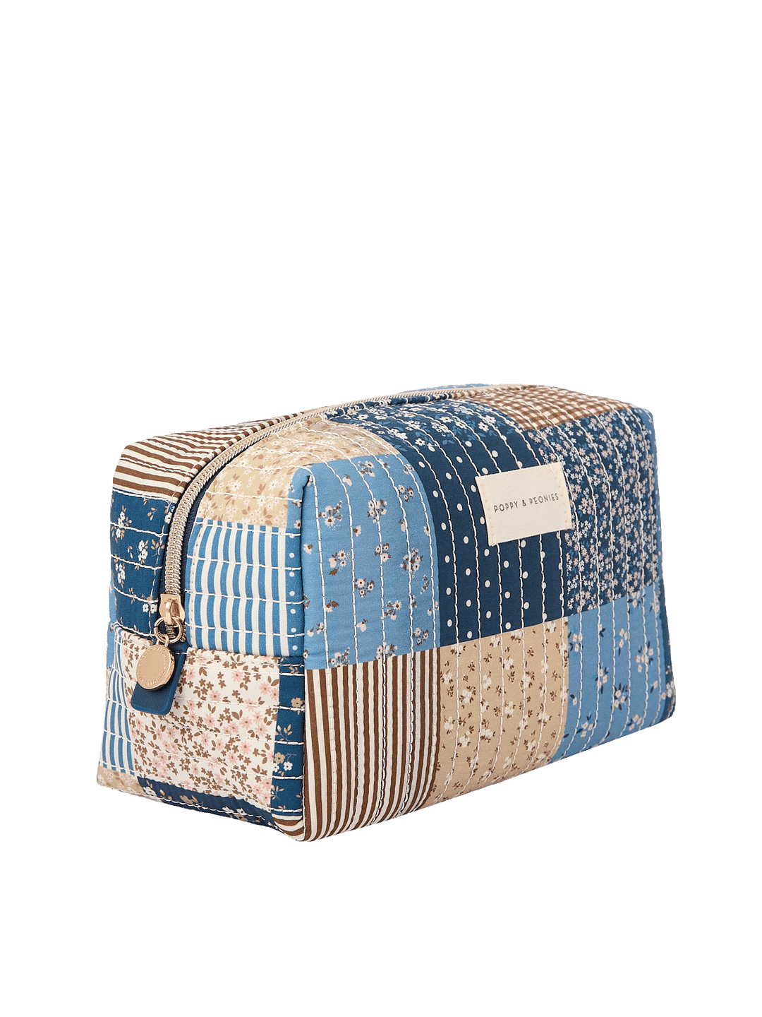 Angled side view of large Cosmetic Trio pouch in Navy Patchwork