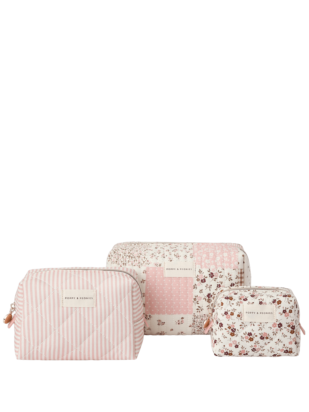 Set of three pink and white patterned cosmetic bags