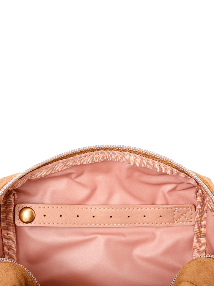 Poppy & Peonies Cosmetic Case in Cognac Suede open interior view, showcasing the blush-pink lining and interior strap detail.