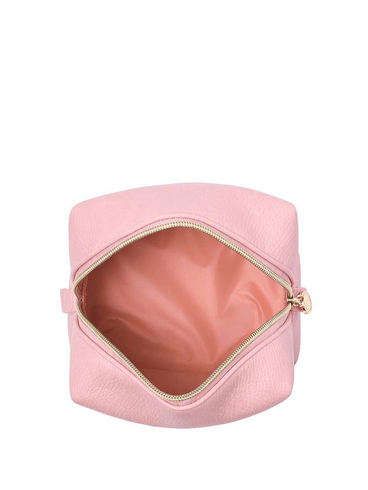 Open pink vegan leather cosmetic case