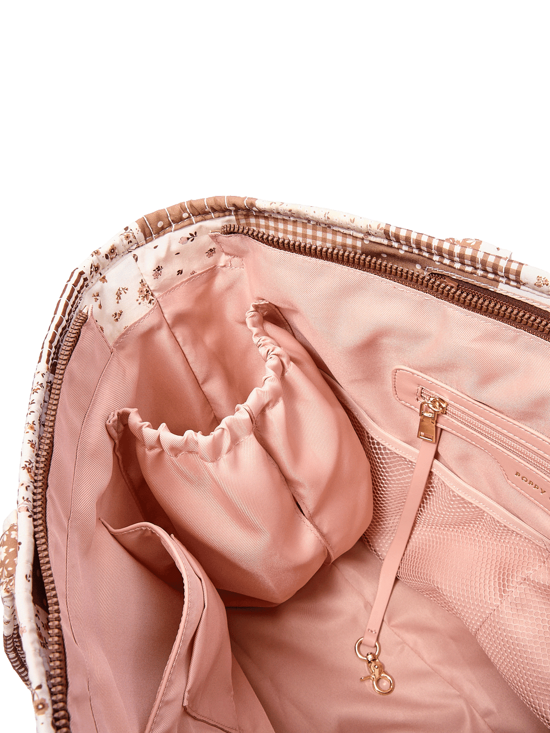 Close-up of the Daydreamer Tote in Brown Patchwork showing interior cup holders and organization pockets