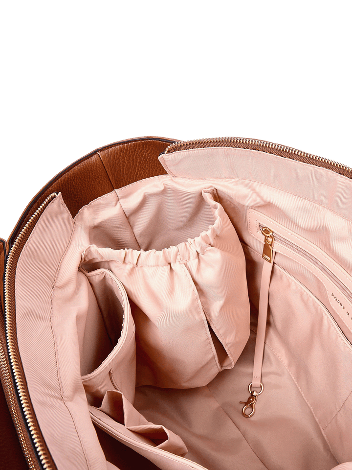 Close-up of Double Duty Tote in Chestnut showing interior organization pockets and key leash