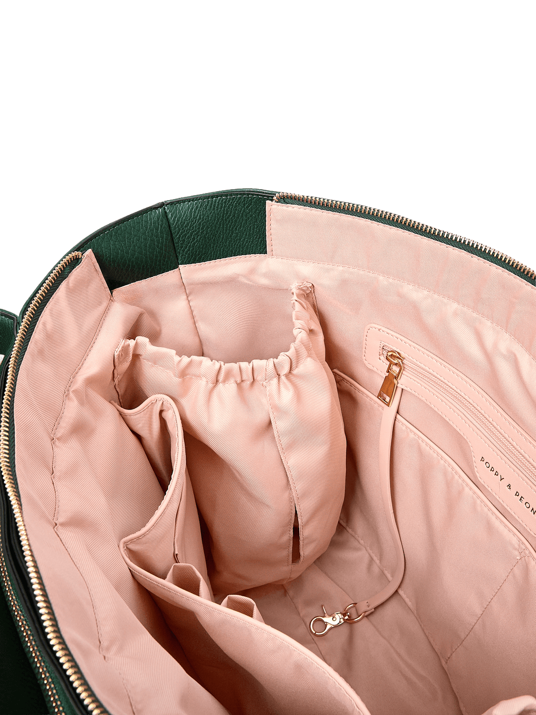 Close-up of the Double Duty Tote in Heritage Green showing interior organization pockets and key leash