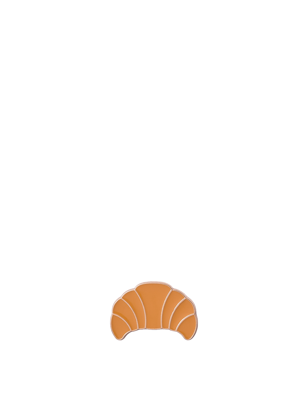 Poppy & Peonies Enamel Pin featuring a golden-brown croissant with curved detailing.