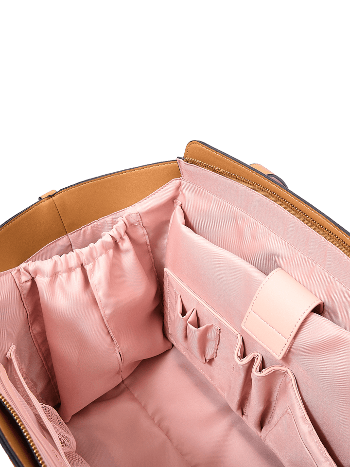 Poppy & Peonies Avenue Tote in Cognac Suede interior close-up, highlighting elasticized pockets and multiple slip pockets for organized storage.