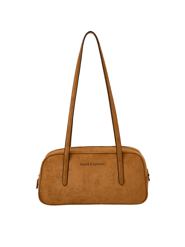 Poppy & Peonies The Friday Satchel in Cognac Suede front view, featuring long shoulder straps, a structured silhouette and signature gold-tone logo.