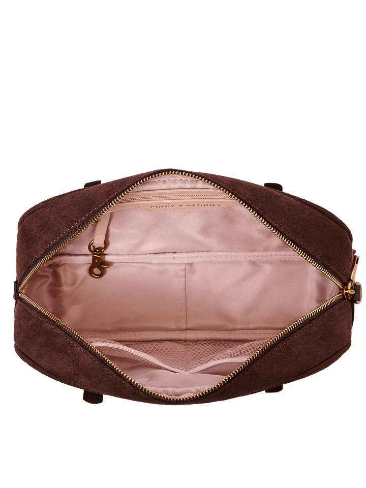 Poppy & Peonies The Friday Satchel in Espresso Suede open top view, showcasing the blush-pink lined interior with slip pockets, mesh pocket, zippered pocket and key clip.