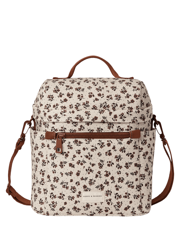 Floral-patterned lunch bag with brown straps 