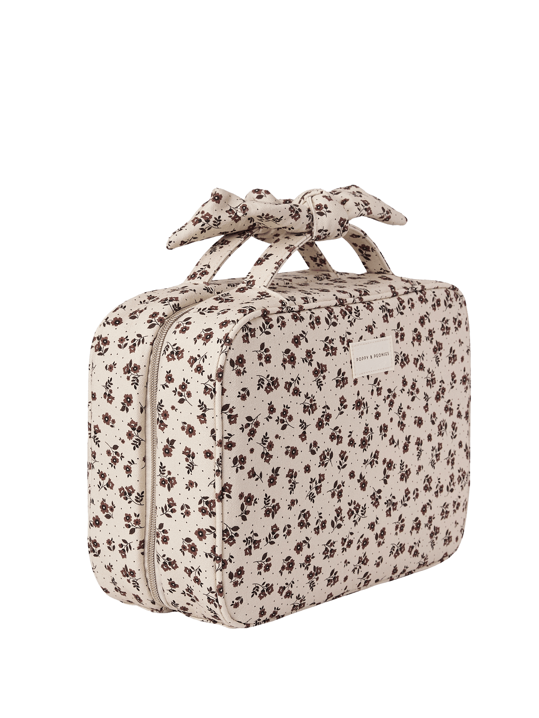 A floral-patterned travel makeup bag with a bow 